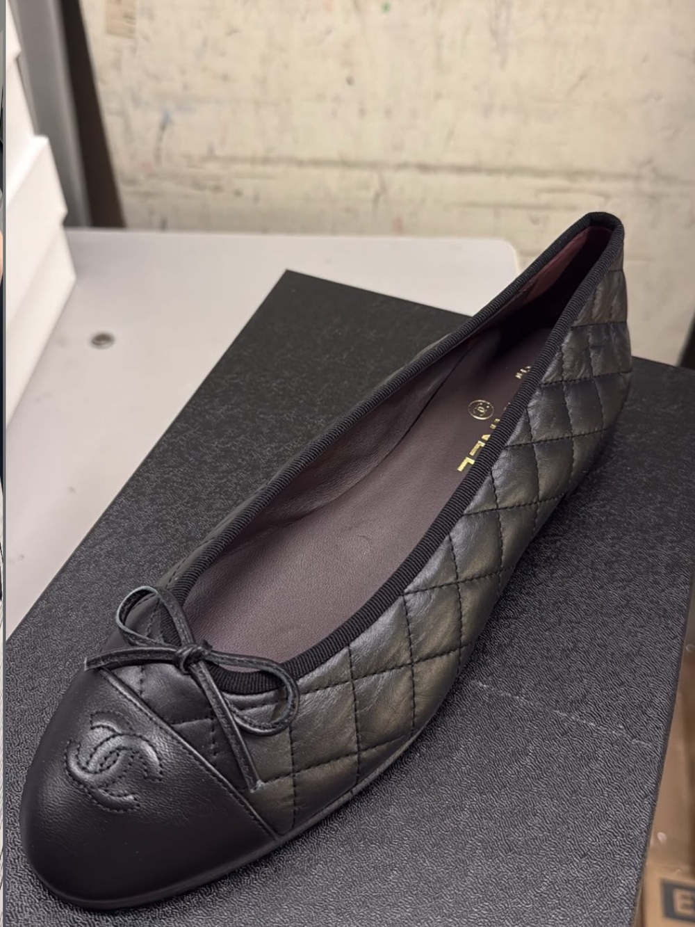 CHANEL Black Quilted Leather Ballet Flat with CC Cap Toe